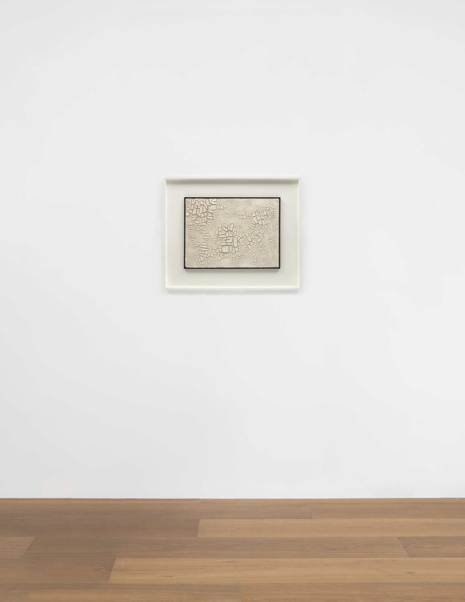 Install view of Alberto Burri's work Cretto bianco (White crack), 1958