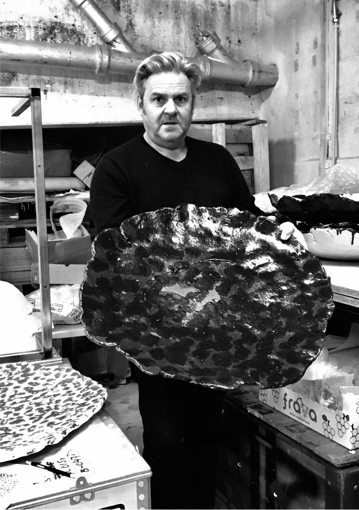 Black and white image of Peter Regli in his studio