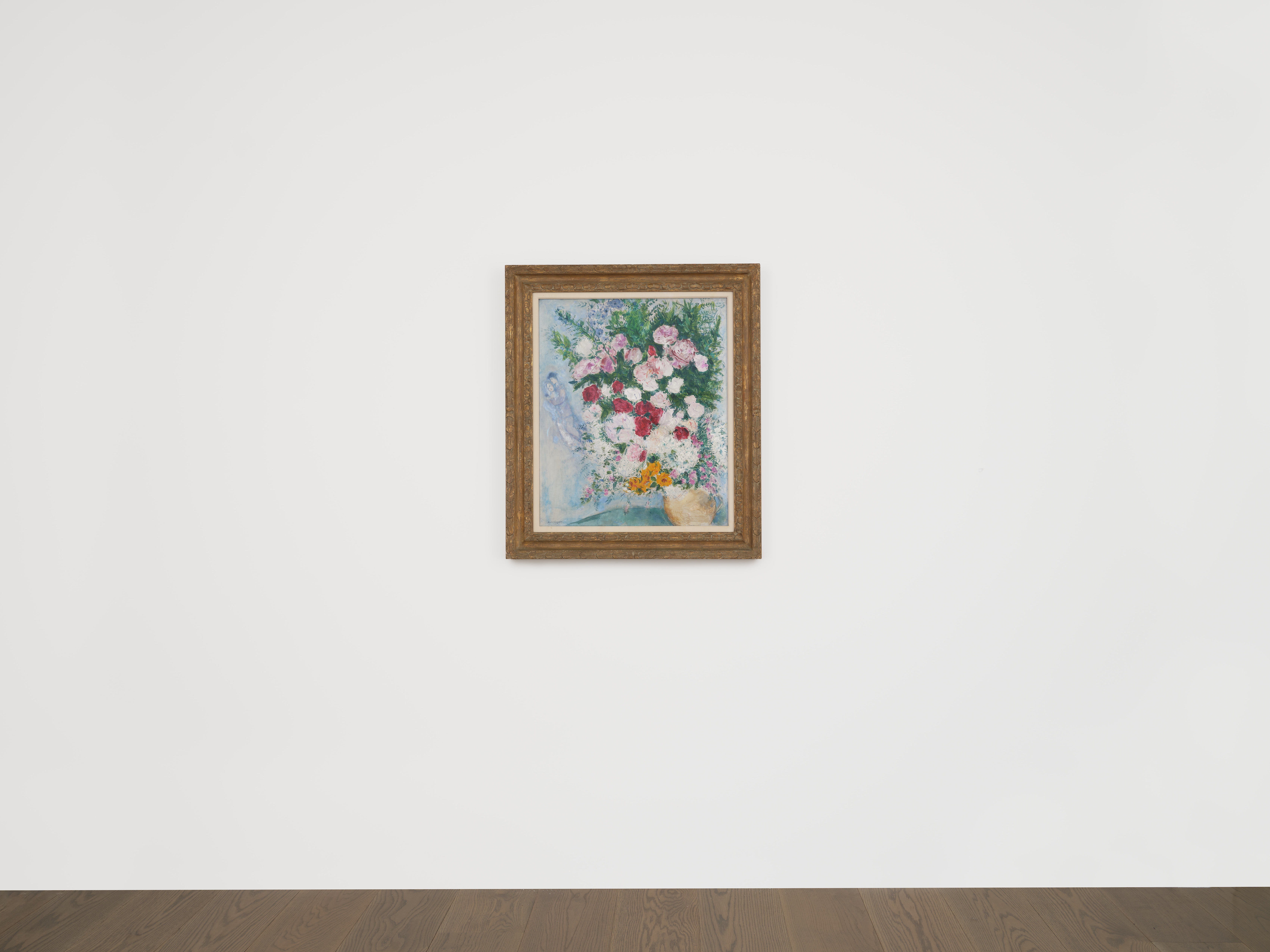 Installation view of Marc Chagall's painting titled Les amoreux au bouquet de fleurs