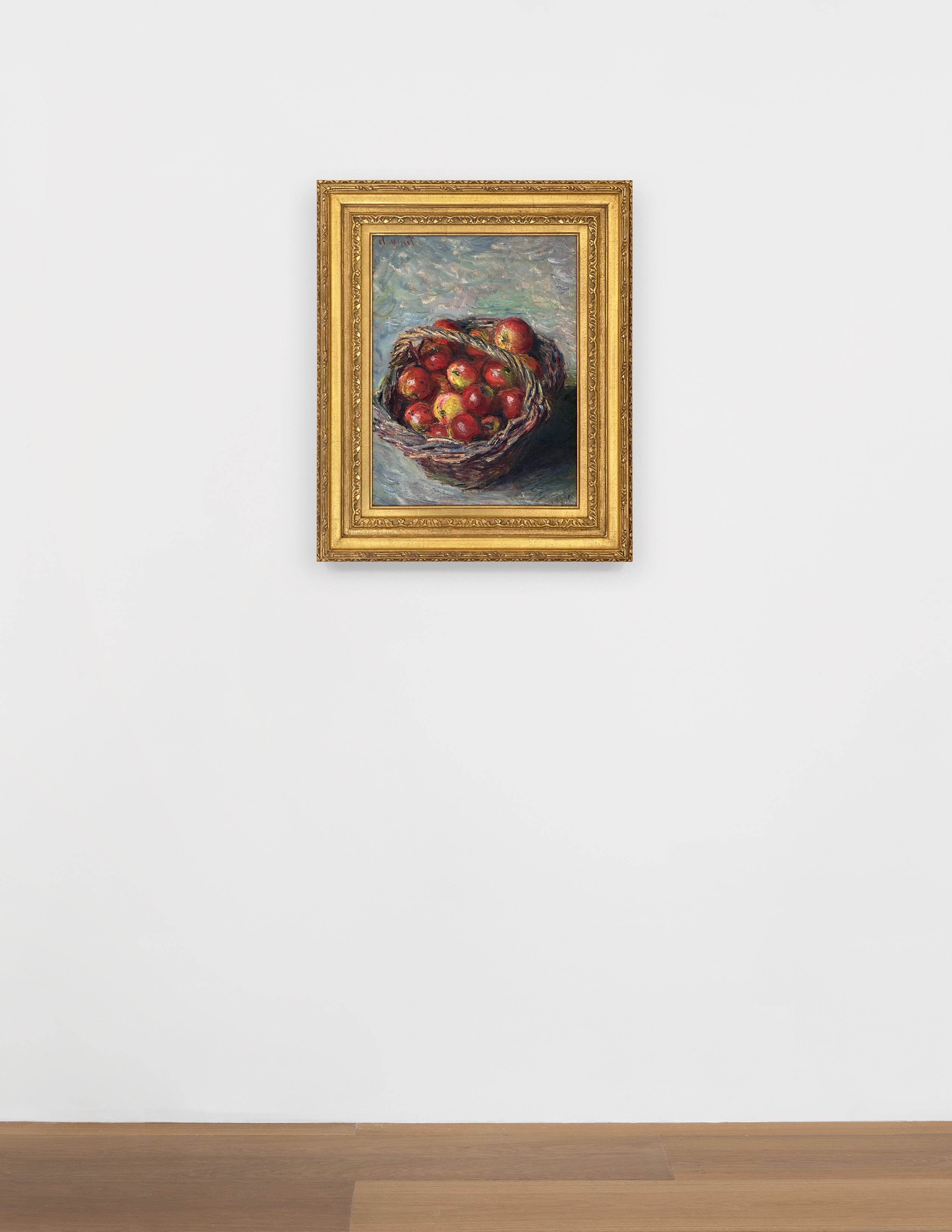 Installation view of Claude Monet's painting Panier de pommes