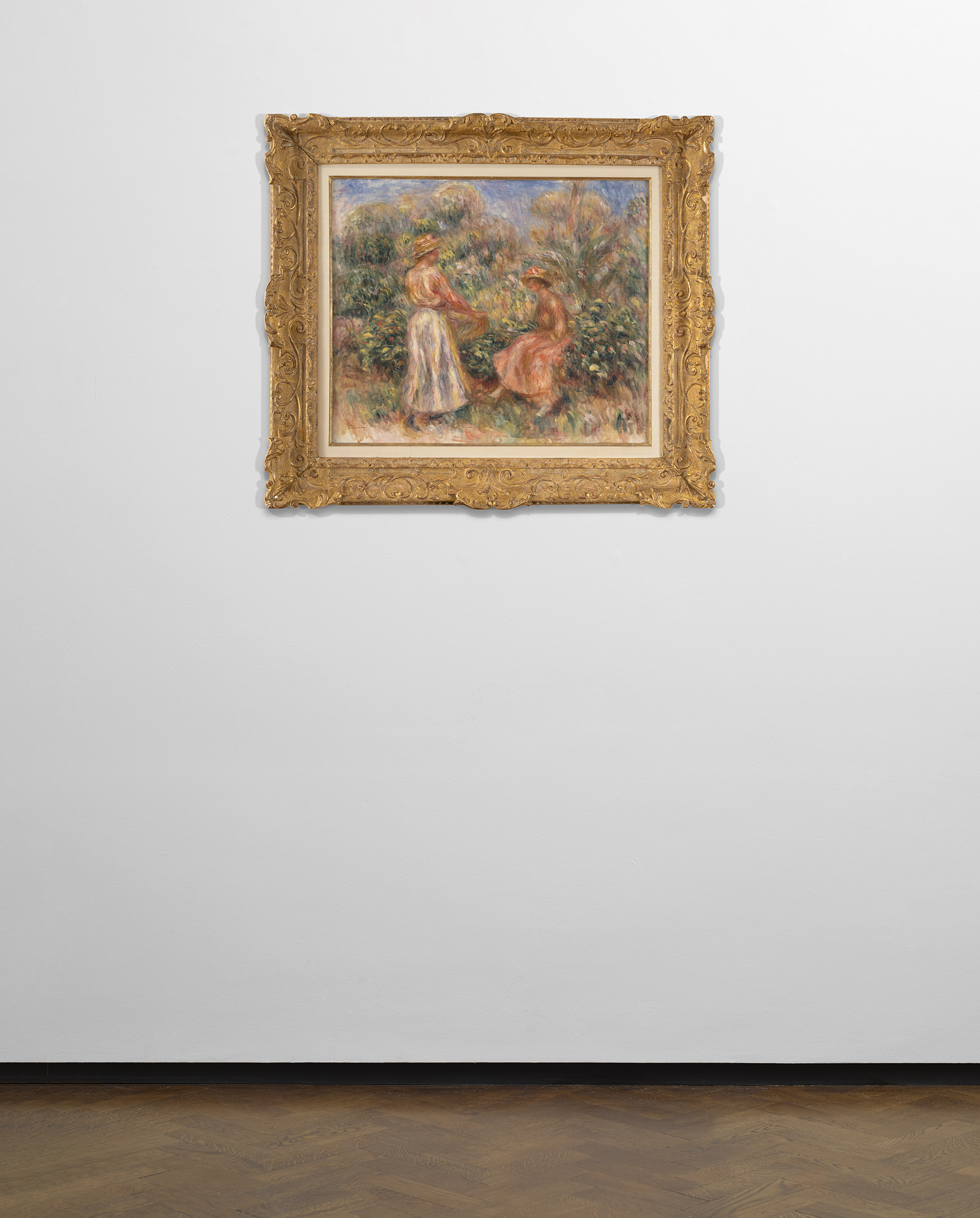 Installation view of Pierre-Auguste Renoir's painting titled Deux femmes dans le jardin de Cagnes