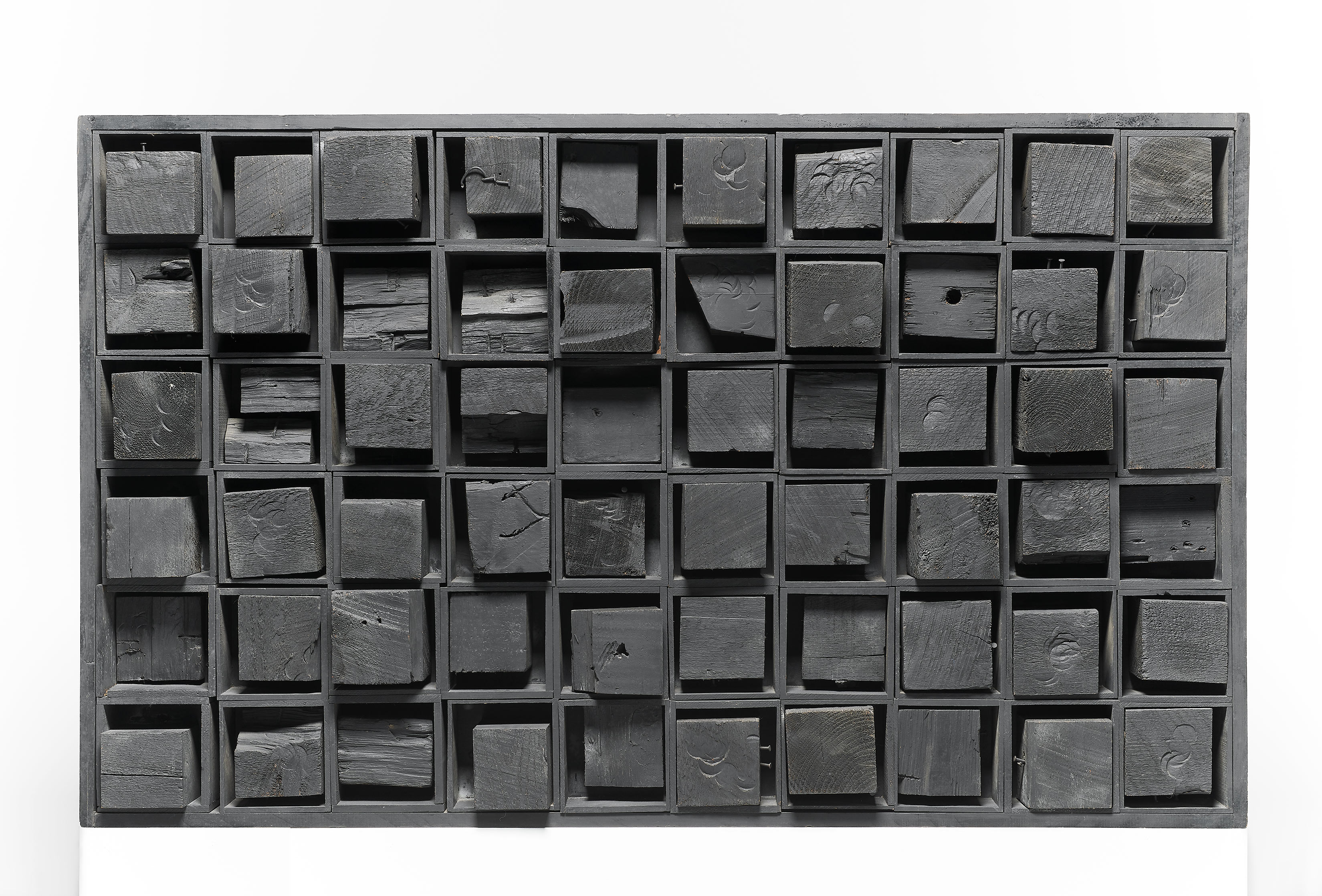 Louise Nevelson's black painted wood sculpture Ancient Secrets II