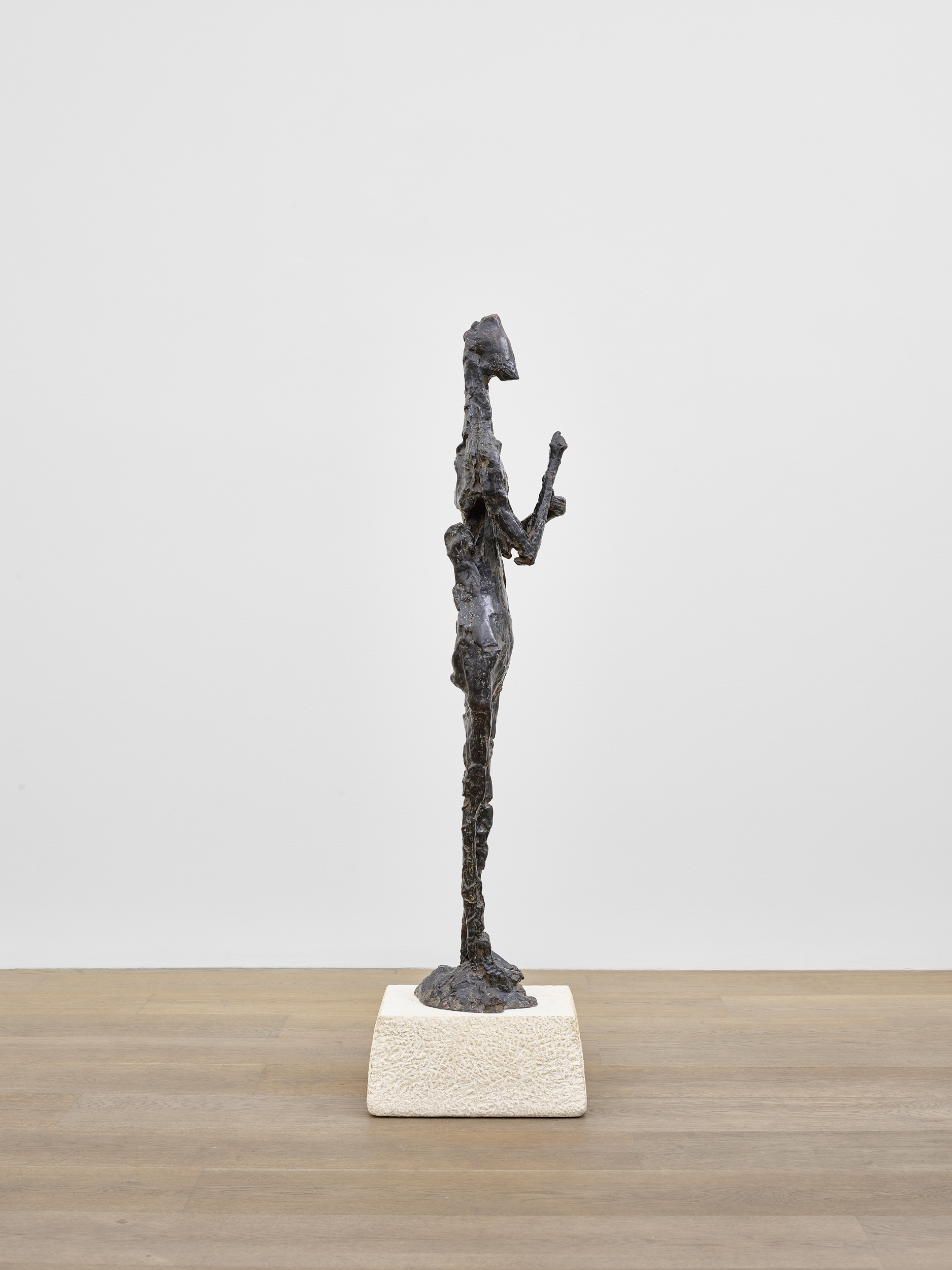 Sideways installation view of Germaine Richier's bronze sculpture Le Grain