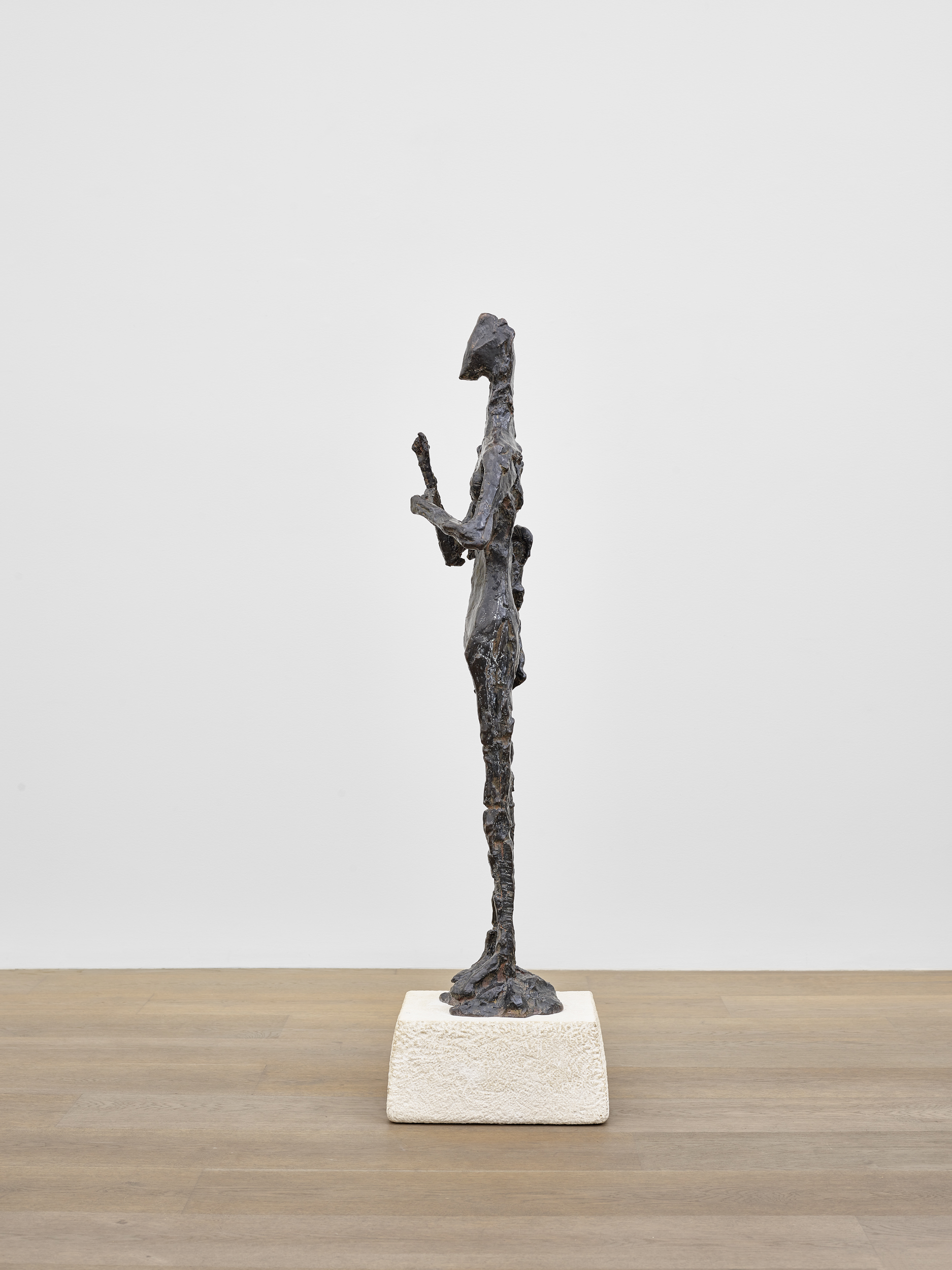 Sideways installation view of Germaine Richier's bronze sculpture Le Grain