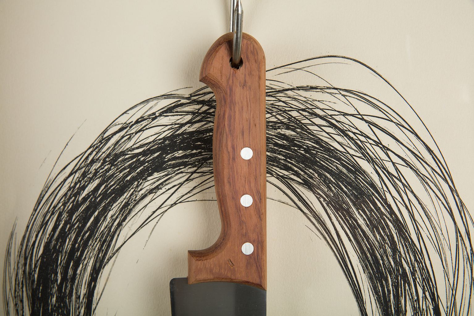 Detail view of Jannis Kounellis's work Untitled (Hanging Knife)