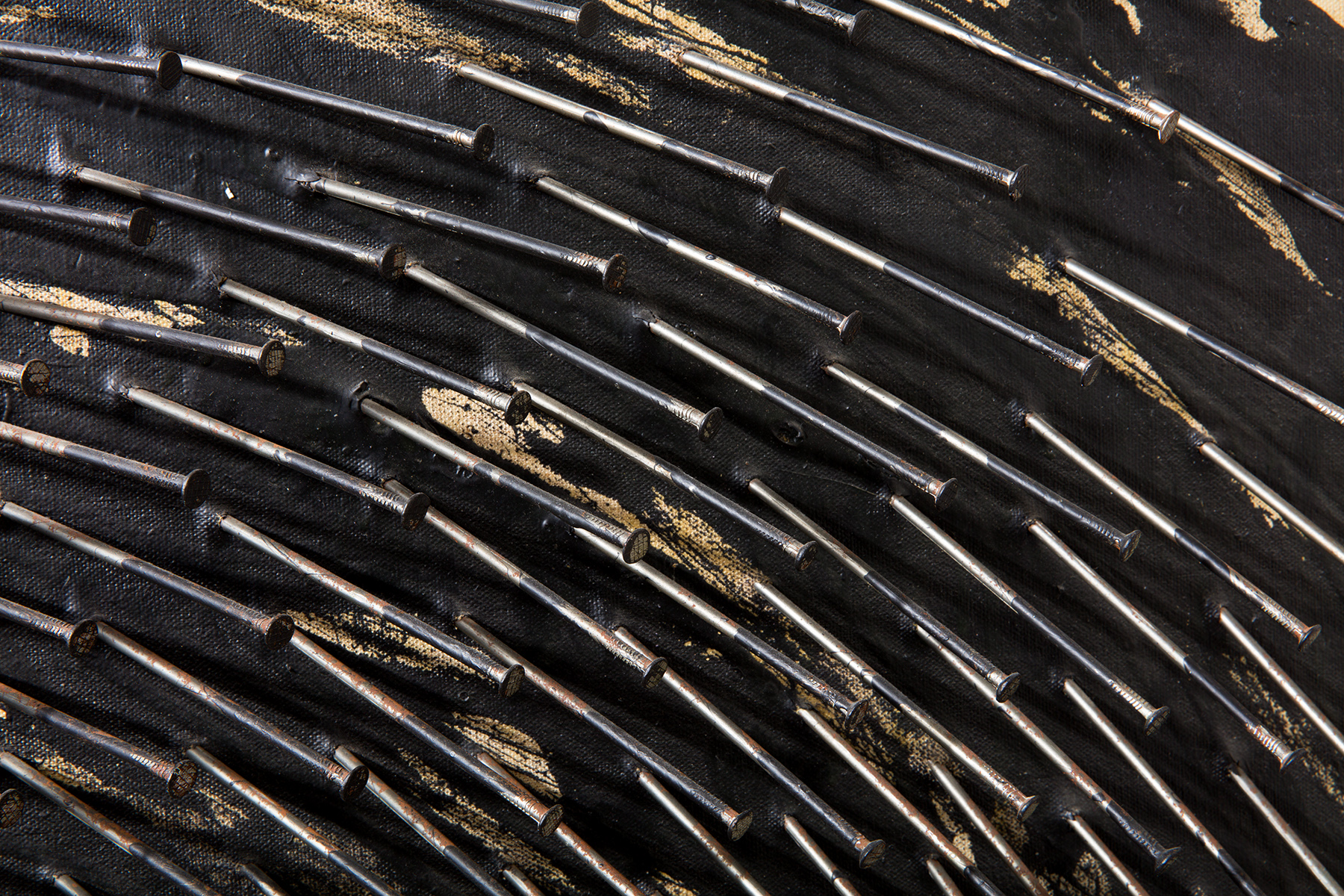 Detail view of Gunther Uecker's nail painting Schwarze Spirale