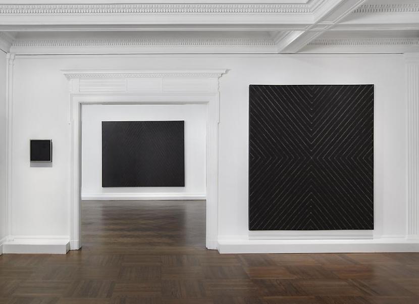 Installation view of the exhibition Frank Stella: Black, Aluminum, and Copper Paintings